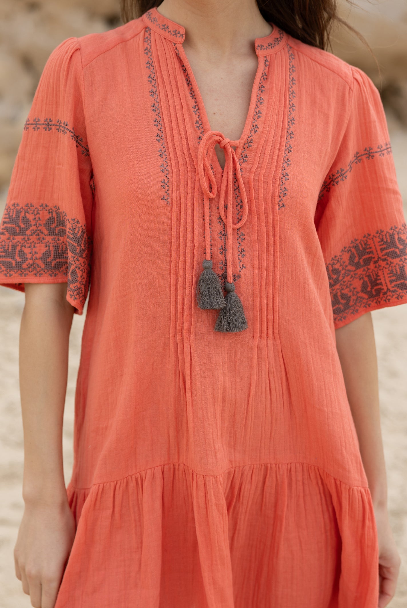 Close up details of the embroidery and pleats on the Rose and Rose Ajaccio dress.
