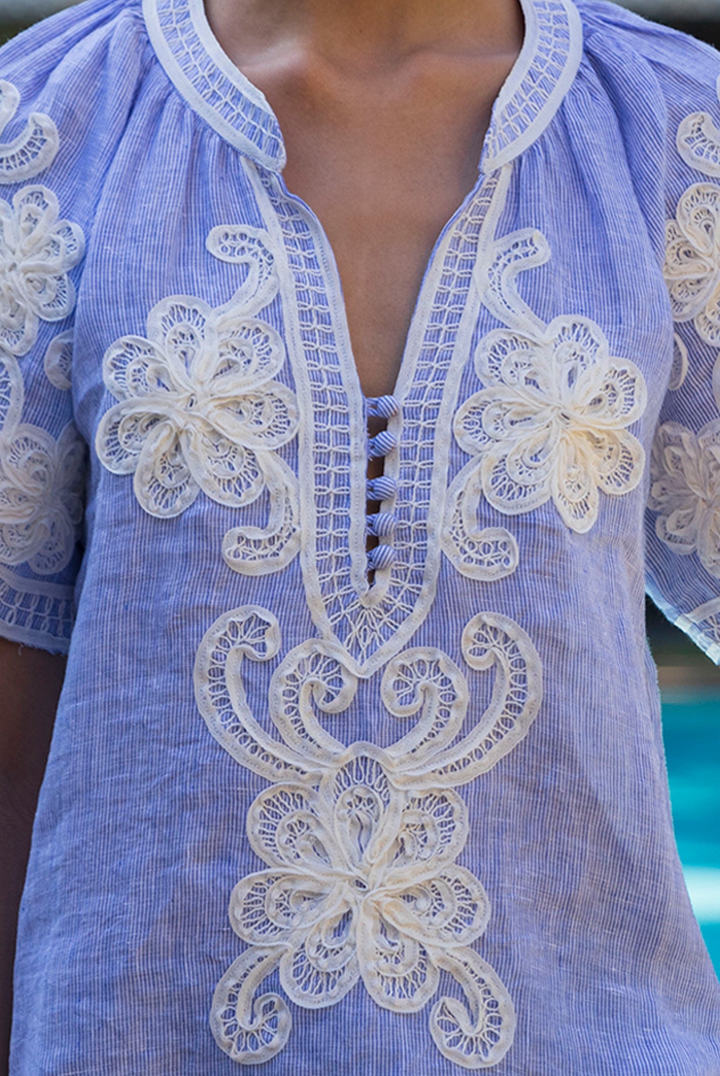 Blue striped blouse with white floral tapework embroidery