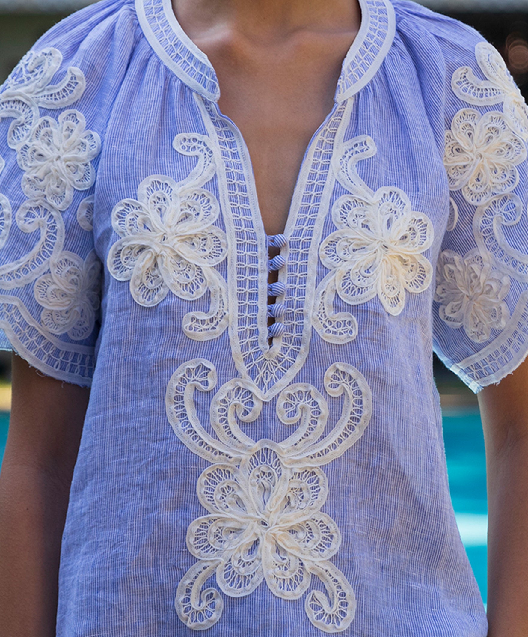 Blue striped blouse with white floral tapework embroidery