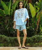 A model wearing a Rose and Rose white Barbican shirt.