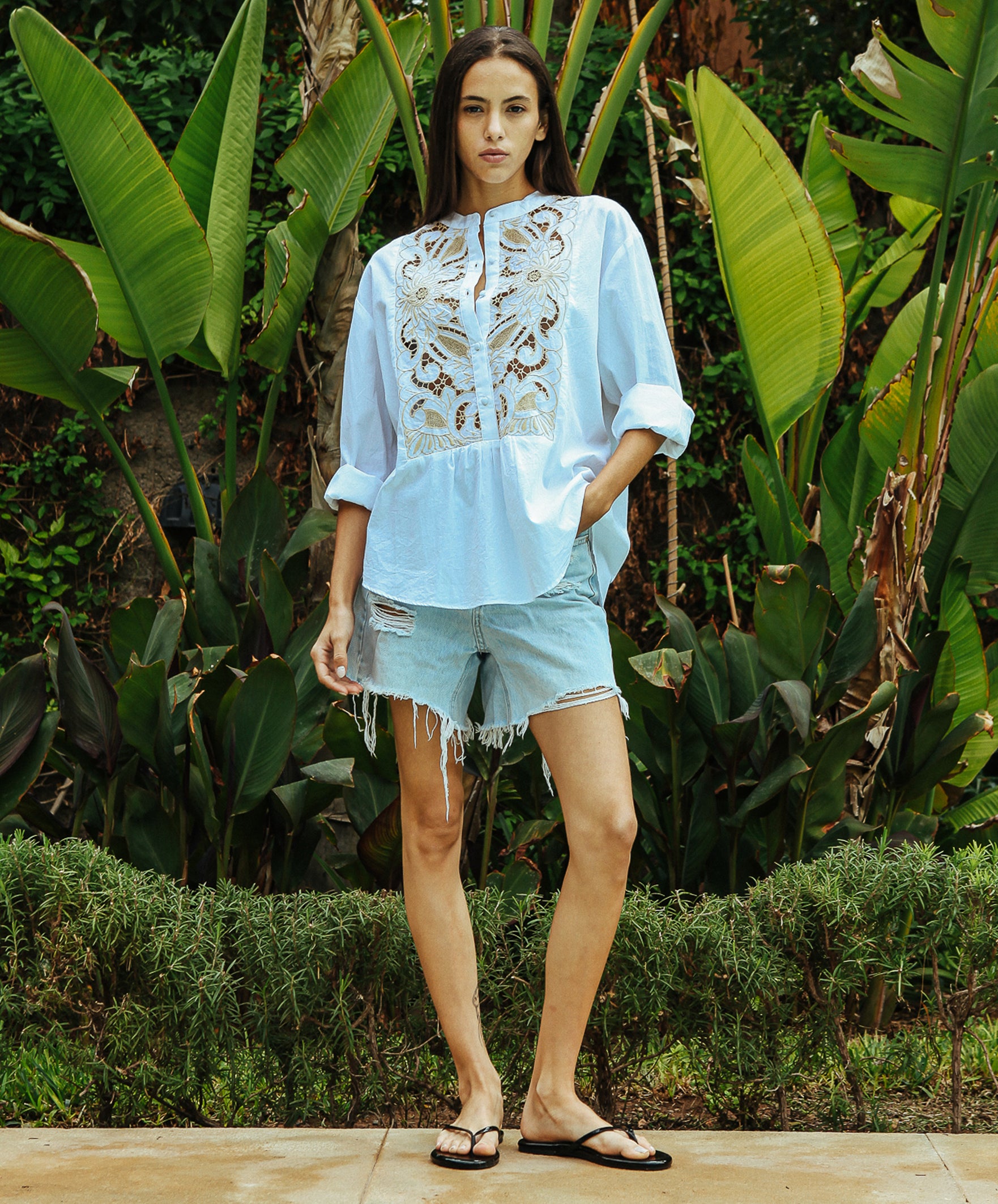 A model wearing a Rose and Rose white Barbican shirt.