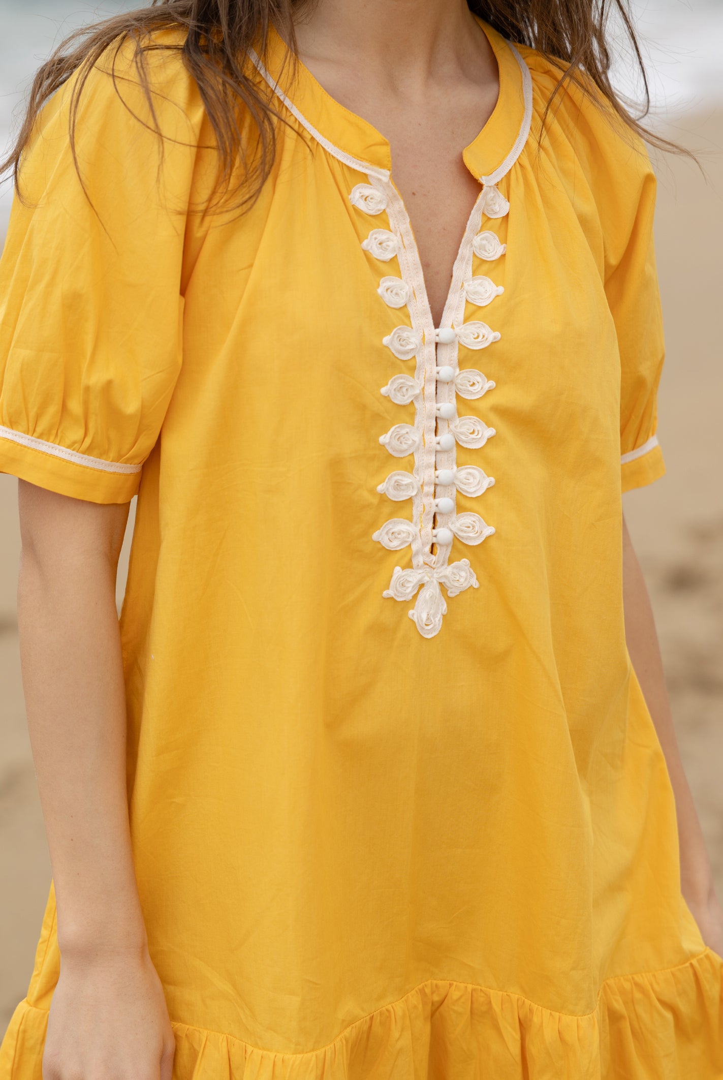 Close up of the passementerie on the Rose and Rose Cannes cotton dress.