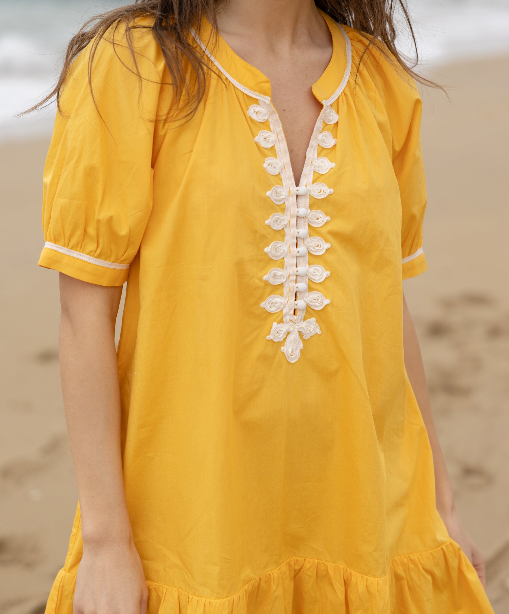 Close up of the passementerie on the Rose and Rose Cannes cotton dress.