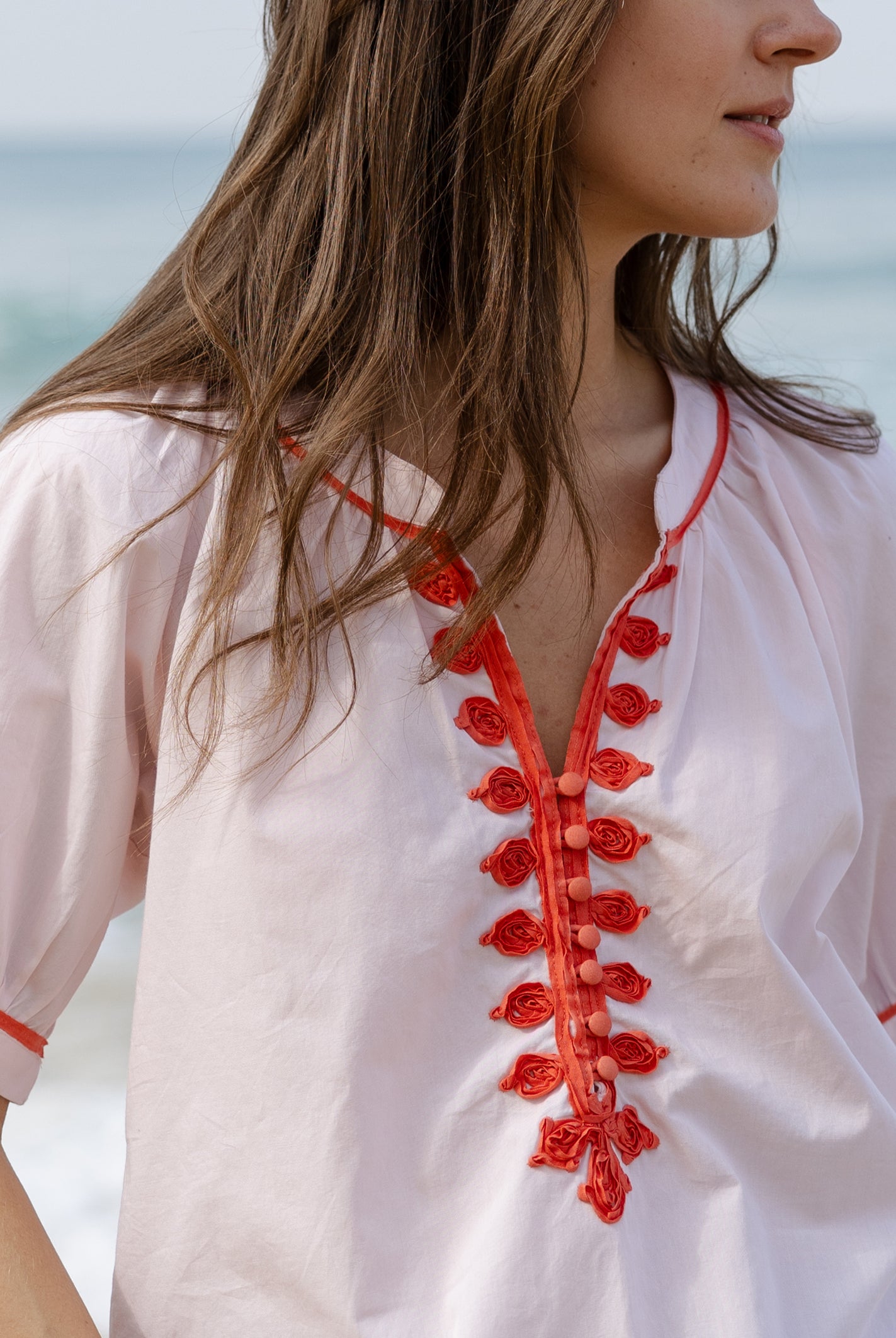 Close up details of the passementerie decoration on the Rose and Rose pink cotton Cote D'Azur top.