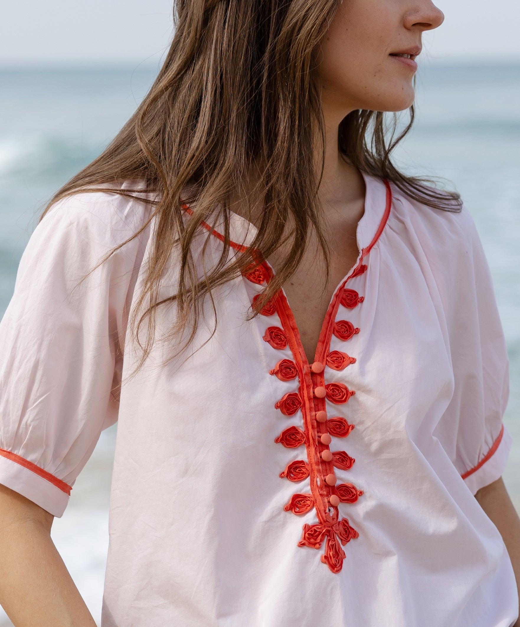 Close up details of the passementerie decoration on the Rose and Rose pink cotton Cote D'Azur top.