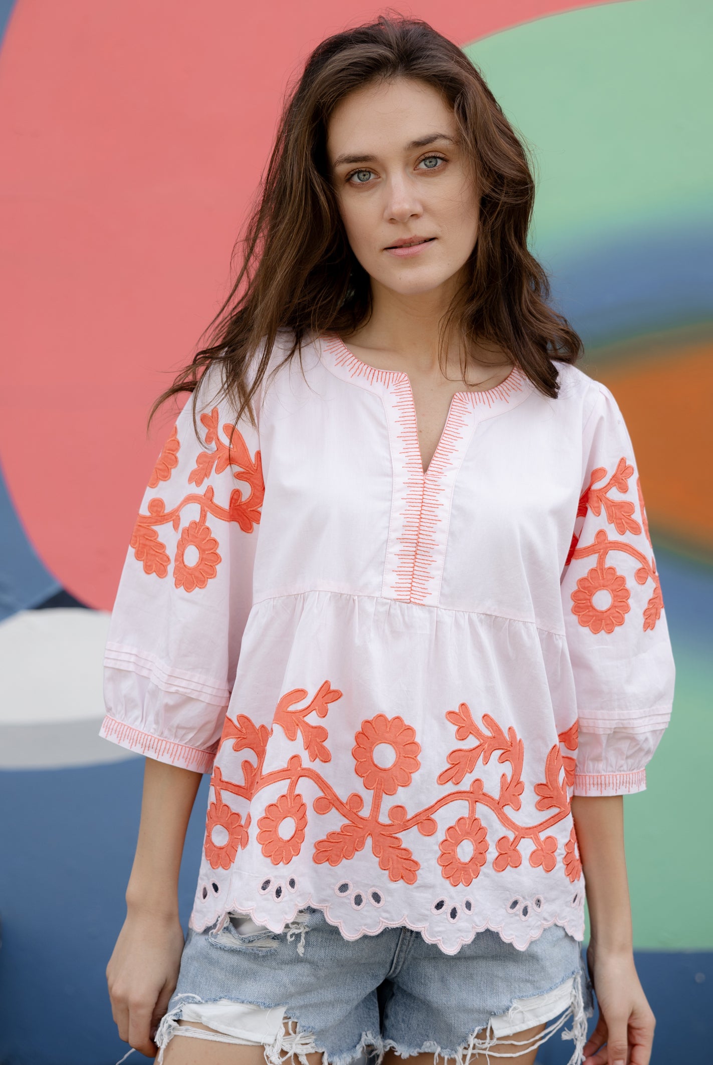 A model wearing a Rose and Rose Nantes top in shell pink cotton.