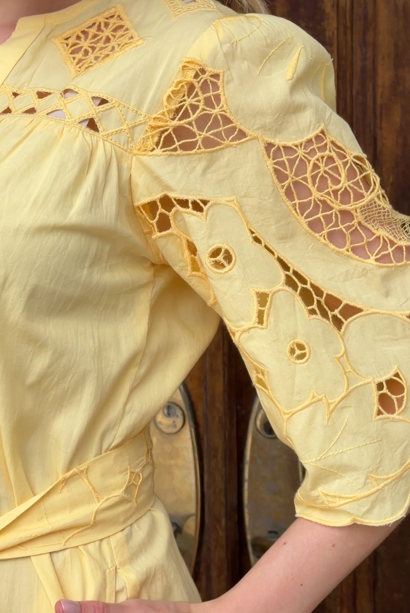 Influencer @viktoria_myr showing the embroidery details on the Dahlia dress.