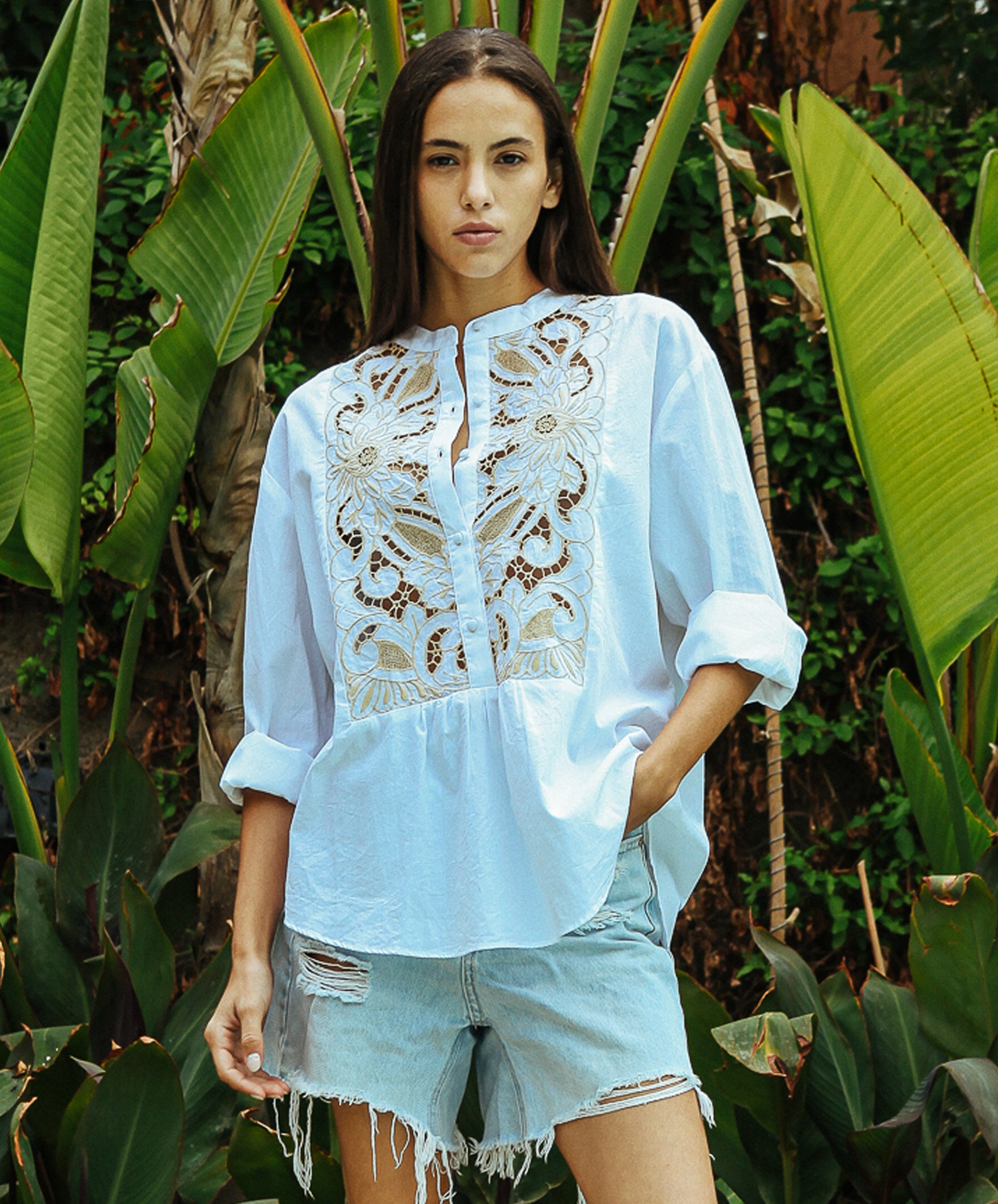 A model wearing a Rose and Rose white Barbican shirt. 