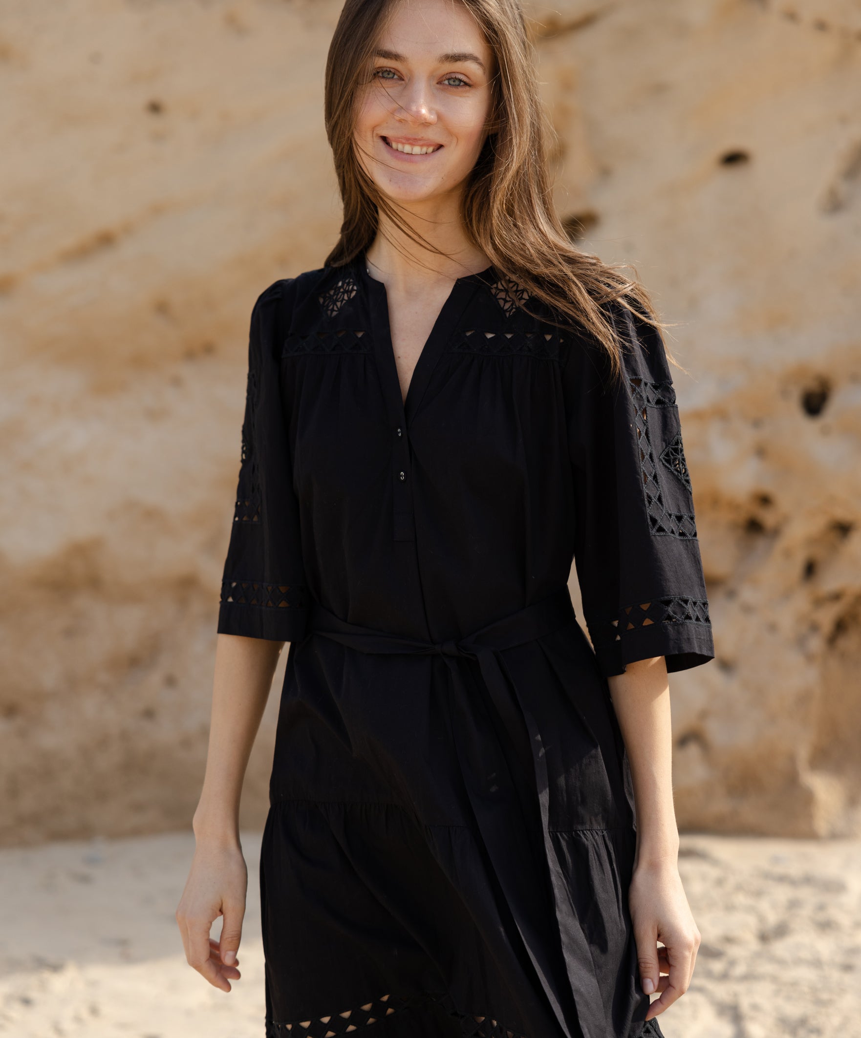 Close up embroidery and cut out details of the Rose and Rose Biarritz cotton dress. 