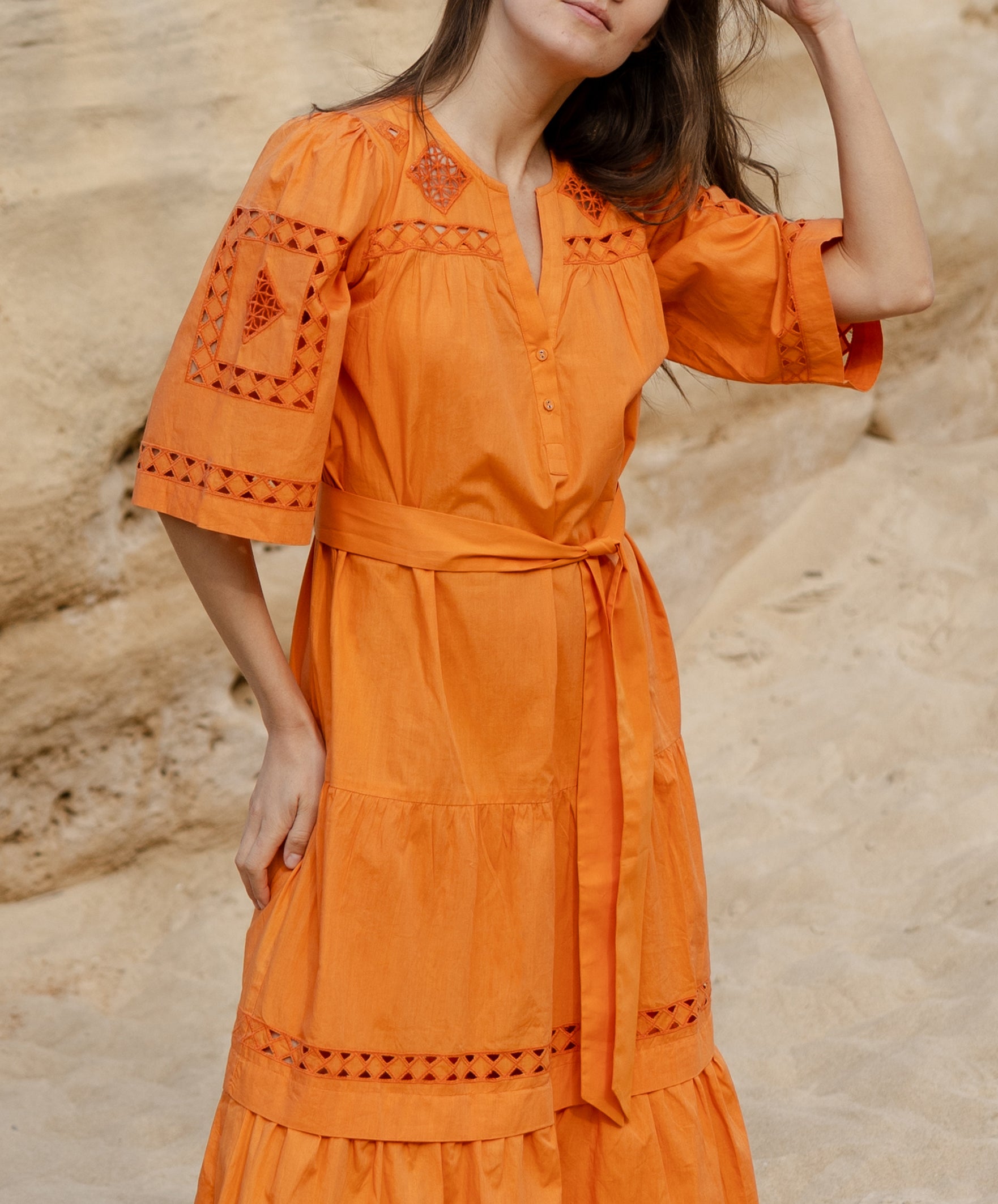 Close up embroidery and cut out details of the Rose and Rose Biarritz cotton dress. 