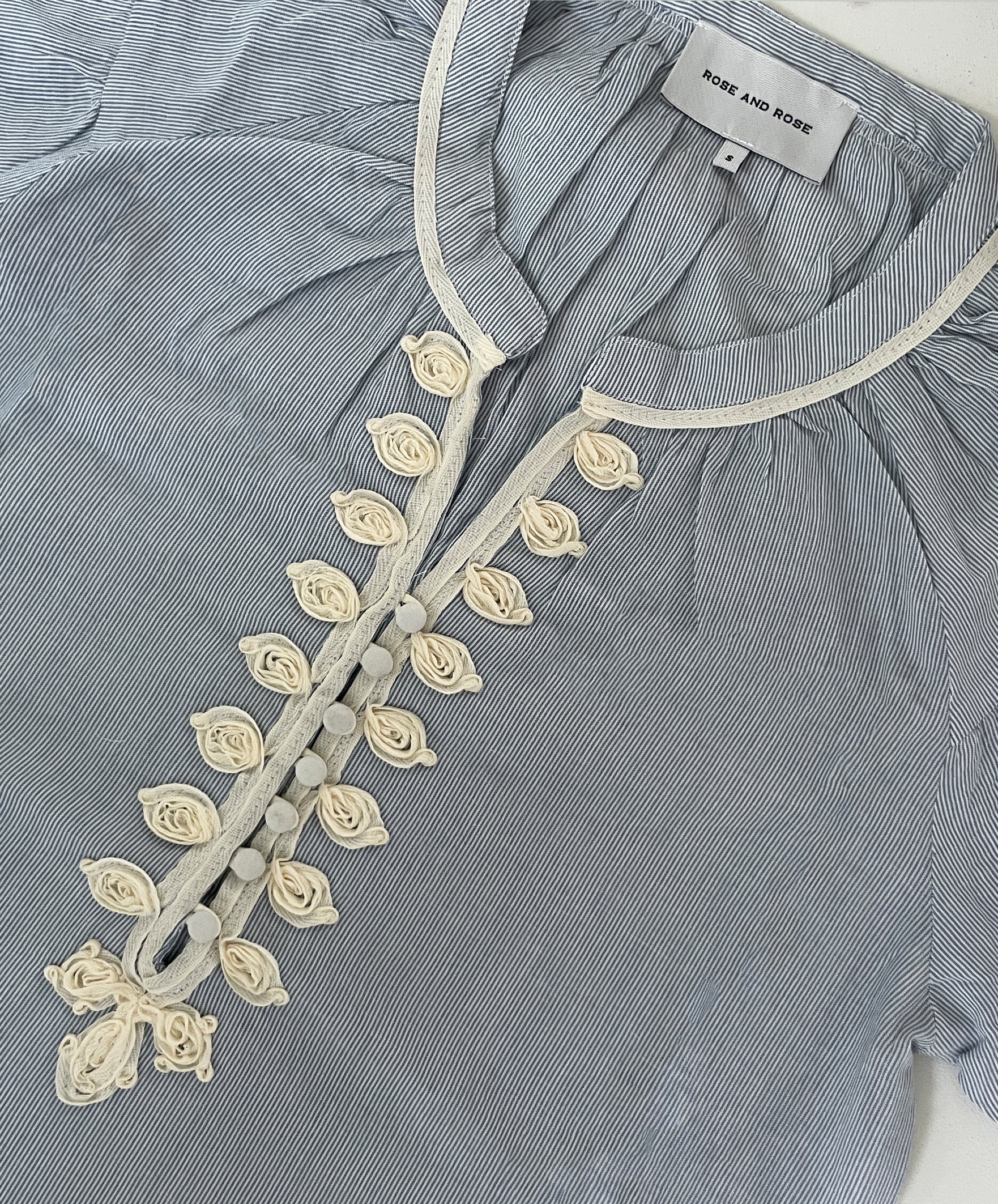 Blue and White striped Rose and Rose garment with white embroidery decoration