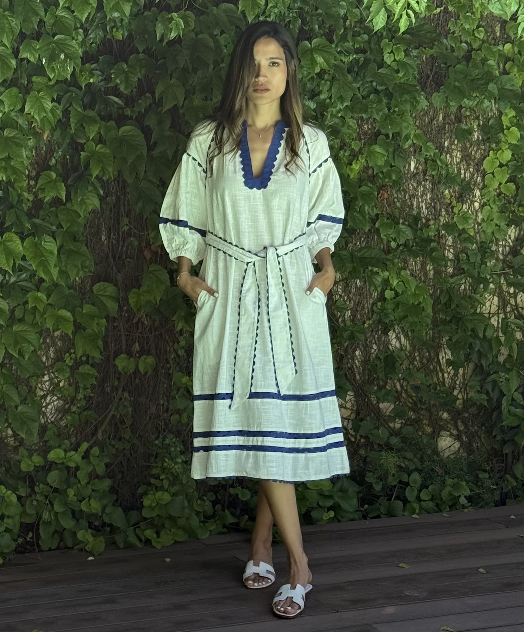 A model wearing a Rose and Rose Fulham dress. 