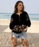 A model wearing a Rose and Rose Nantes top in black.