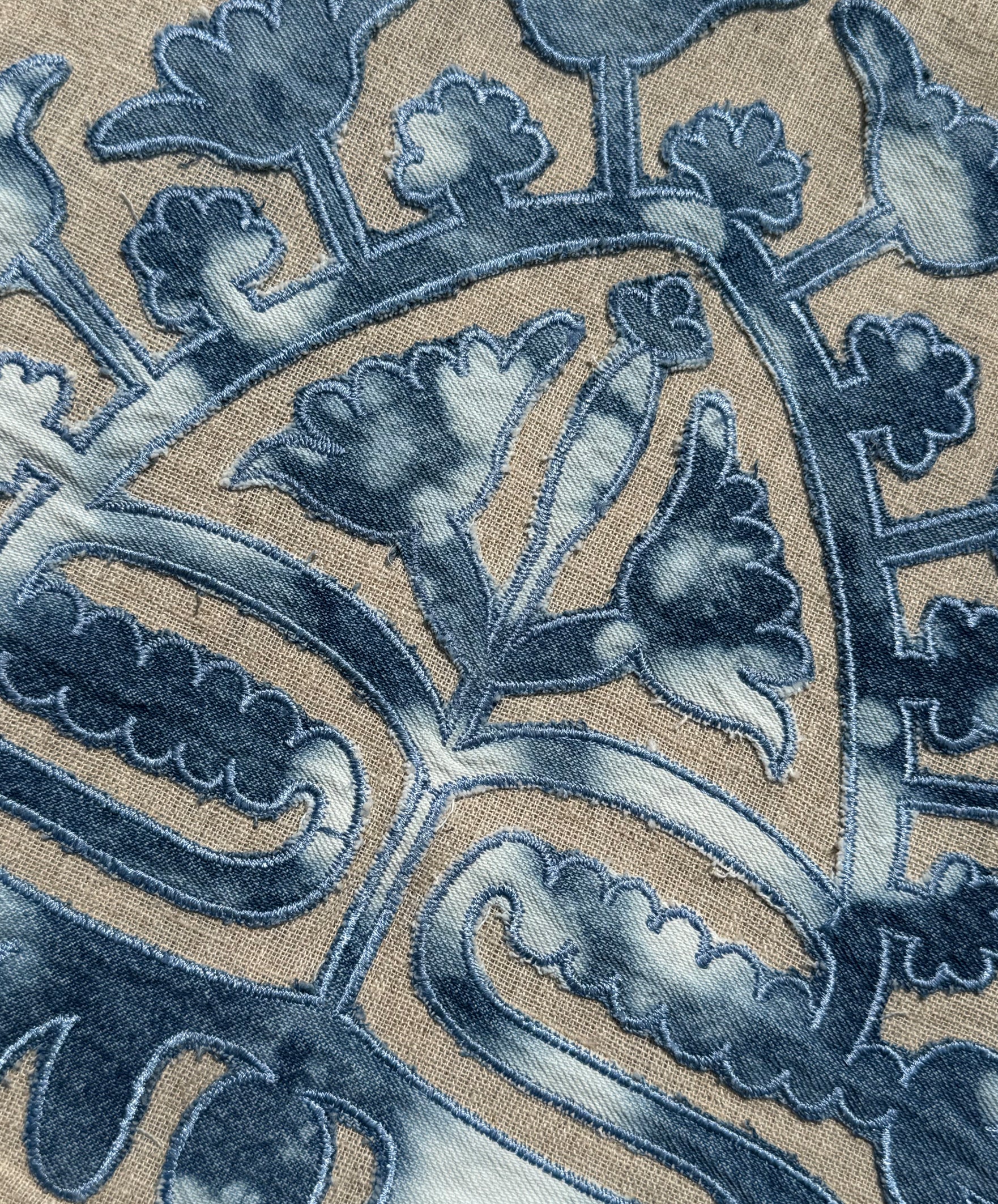 Close up of the applique decoration on Rose dress.