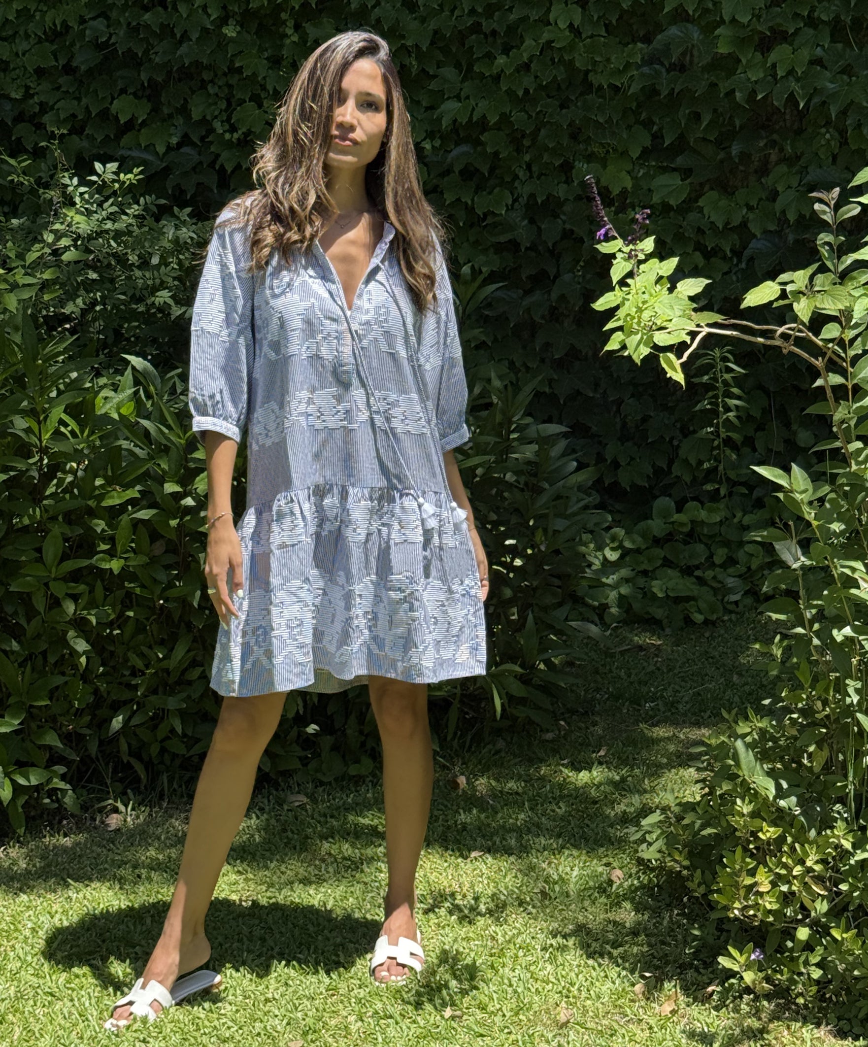 A model wearing a Rose and Rose Snaresbrook dress.